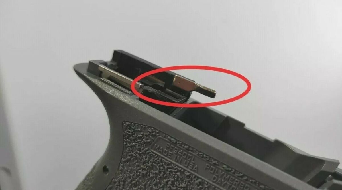 Vyhazovač součástí těla pistole Glock
